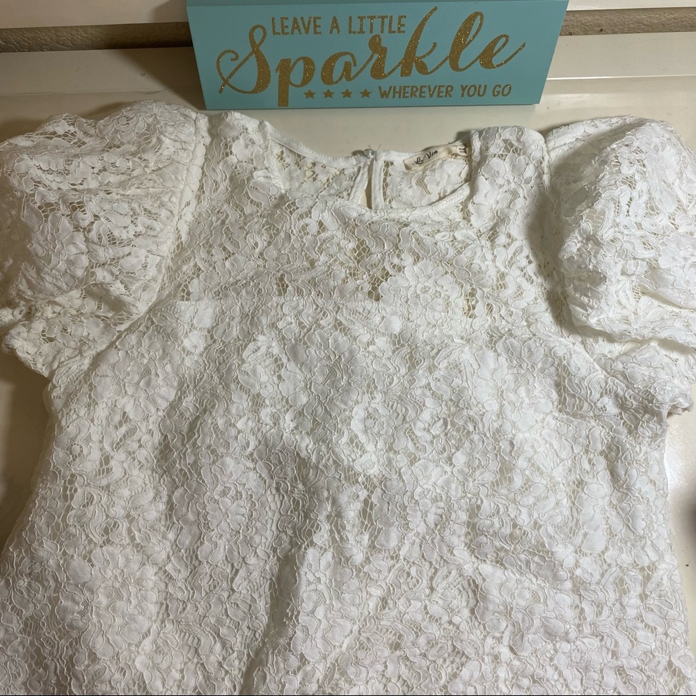 Lovely lace La’ Ven blouse. Pair it with a messy updo and your fave skinnies!